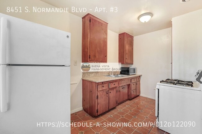 Building Photo - 8451 Normandie Ave