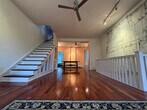 Living room, dining room, stairs to bedroom & deck - 106 Fairmount Ave