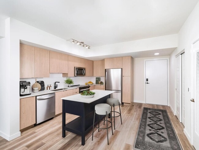 Thoughtfully designed kitchens at Modera Aventura combine clean finishes with functionality for everyday ease. - Modera Aventura