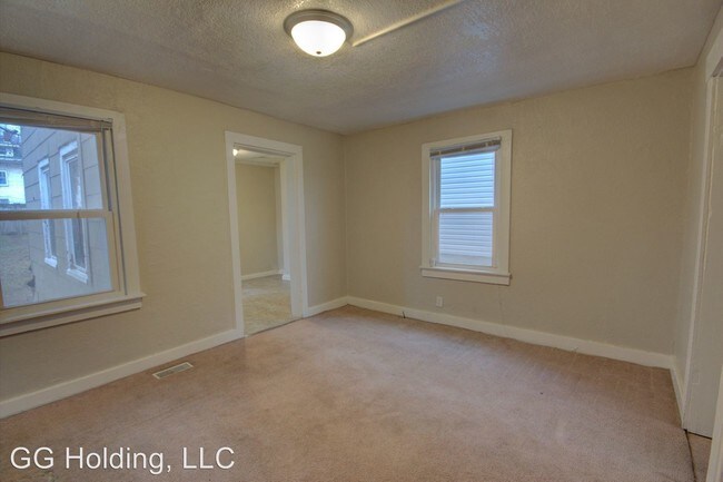 Building Photo - 4 br, 2 bath House - 1236 W. 7th St.