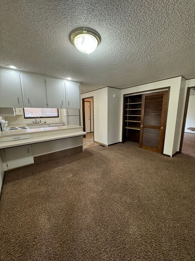 Building Photo - Non-Refundable & Security Deposit Total: $...