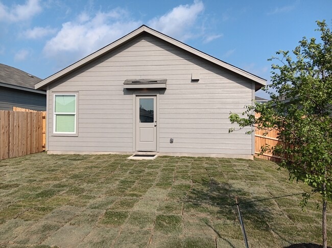 Rear View and Back Yard - 20336 Red Coral