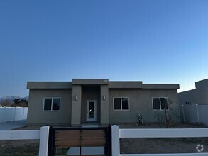 Building Photo - 9306 E Ave T 6