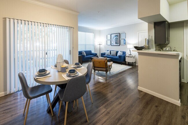 Building Photo - Live Large, Save Larger