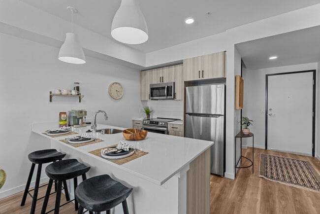 Building Photo - Zinnia Building Photo - Zinnia