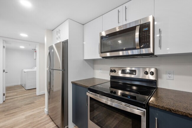 Photo du bâtiment - 1-Bedroom Apartment
