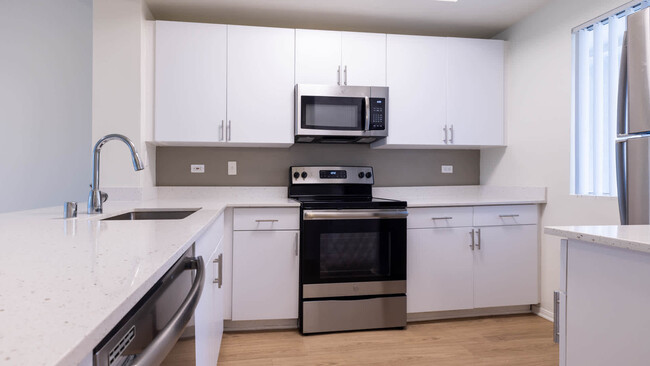 Kitchen with Stainless Steel Appliances - Toscana