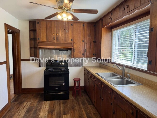 Building Photo - Spacious Living on ~1 Acre! | 3-Car Garage + Extra Covered Parking | Landscaping Included!
