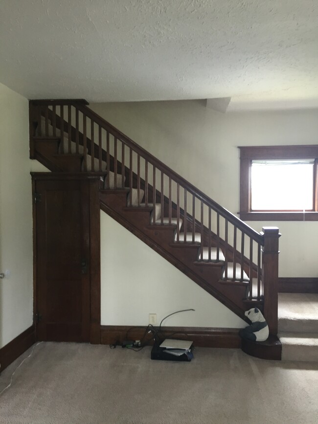 Staircase in living room - 104 Brown St