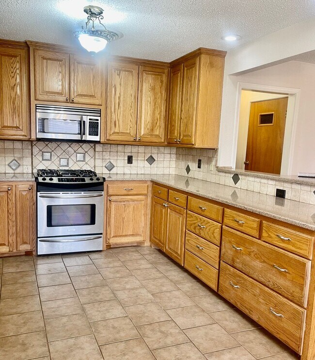 Building Photo - As About Our Move-In Special! Spacious 3 B...