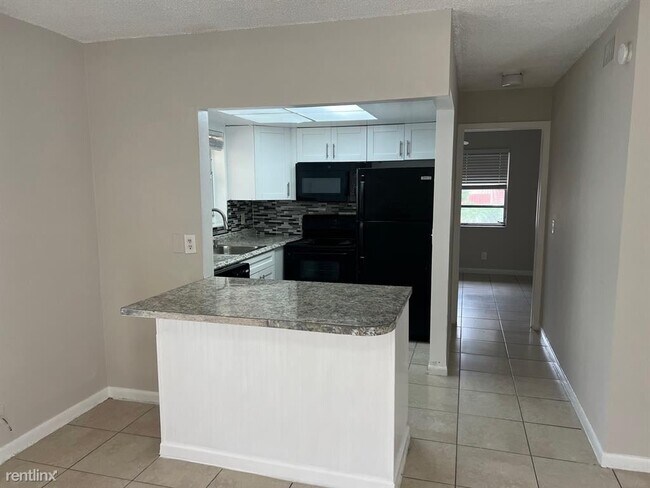 Foto del edificio - 3 br, 2 bath House - 4850 NE 5th Ave # 315