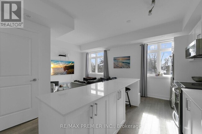 Building Photo - 1115 Douglas McCurdy Cmn