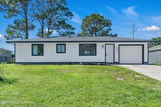 Building Photo - 322 Ixora Ave NW