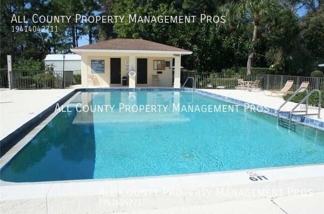 Building Photo - 7060 W Country Club Dr N