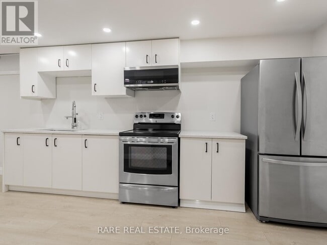 Building Photo - 3551 Wass Crescent