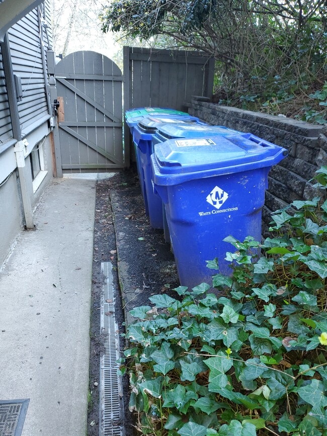 Trash recycle area. - 1867 SW 14th Ave