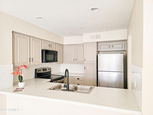 Foto del edificio - 10080 E Mountainview Lake Dr