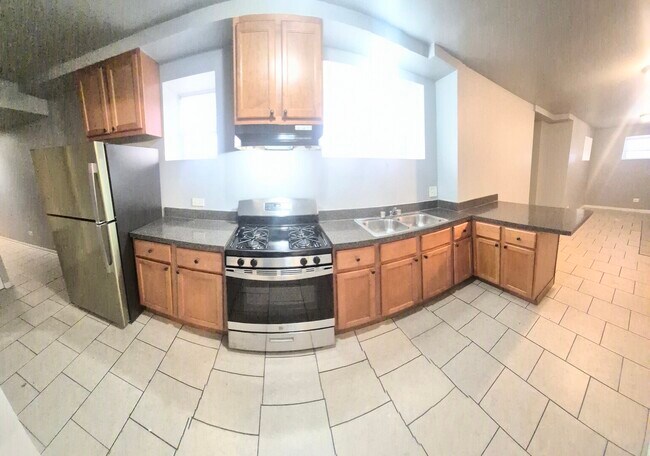 Foto del edificio - 6030 S Eberhart Ave