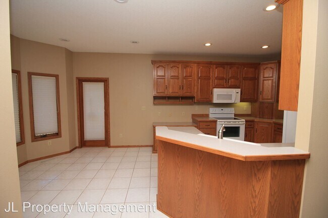 Building Photo - 4 br, 3 bath House - 8704 E Saddle Creek Rd