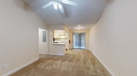 Located at 3113 Cherokee Ave in Columbus, Georgia, this one-bedroom, one-bathroom residence offers a thoughtfully arranged single-floor layout. The living area immediately impresses with its vaulted ceiling and ceiling fan, creating a sense of openness and airflow. Warm, neutral-toned carpeting flows throughout the living and bedroom spaces, while light wood-look flooring ties together the kitchen and bathroom.

The kitchen is designed for functionality, featuring a galley-style layout with cream cabinetry, laminate countertops, black appliances including a refrigerator, range, and dishwasher, and a built-in microwave. A pass-through counter connects the kitchen to the living area, enhancing the open feel. A sliding glass door in the living room provides access to an outdoor area and allows natural light to fill the space.

The bedroom is a comfortable, well-proportioned retreat with its own ceiling fan and a window that brings in additional natural light. A dedicated closet provides convenient storage. The full bathroom features wood-look flooring, a vanity with under-sink cabinetry, a large mirror with overhead lighting, and clean, neutral finishes throughout. This well-maintained residence offers a practical and comfortable living environment in a straightforward, efficient layout.