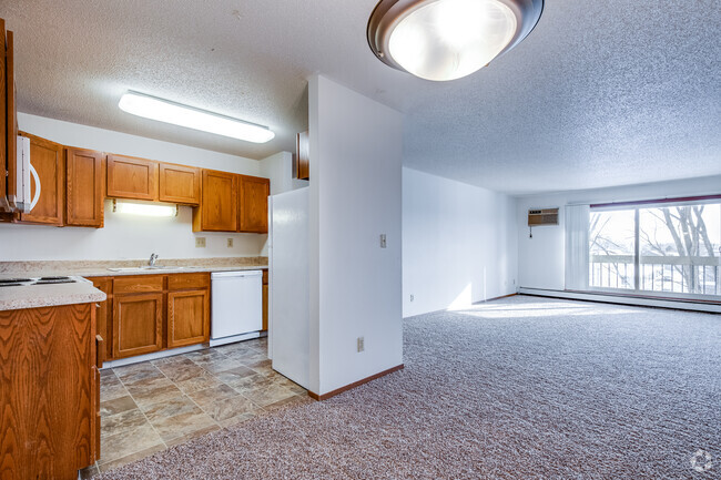 2BR, 2BA - 1068SF - Kitchen and Living Room - Woodridge