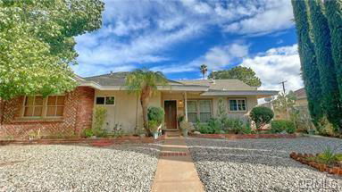 Building Photo - 7846 Woodlake Ave