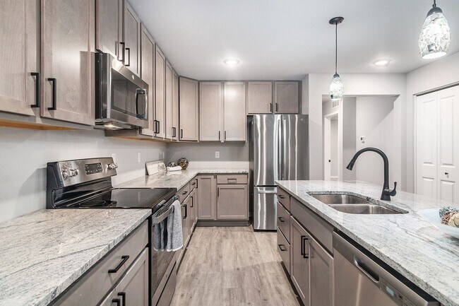 Building Photo - Brand New 5 Bedroom Condo!