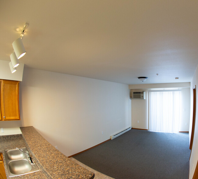 Living room & Balcony - The M Apartments