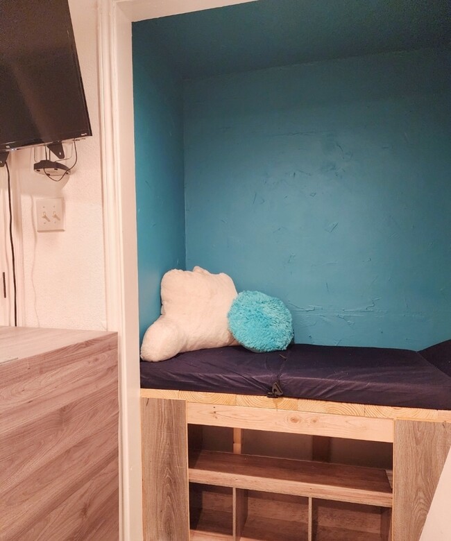 Book nook; can be used as a closet or alternate sleeping space for a child. 59 in - 4209 Sanger Ave