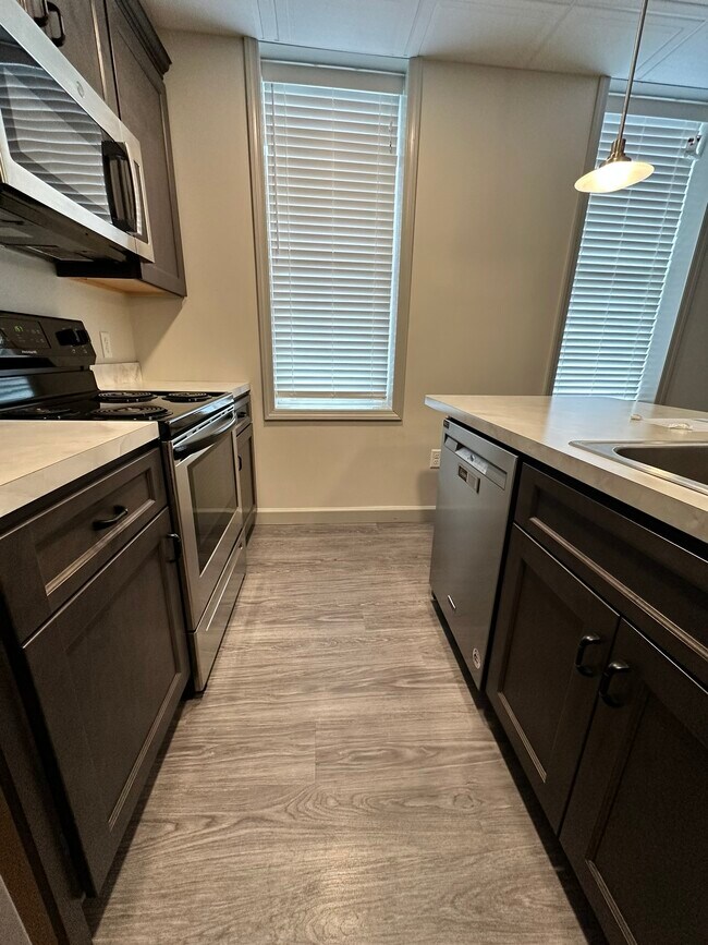 Kitchen island with storage. - 158 E Walnut St