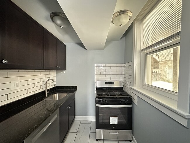 Building Photo - 5664 N Ridge Ave