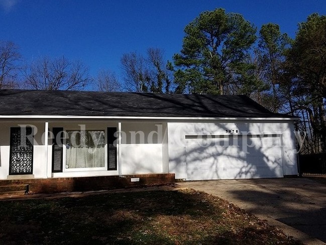 Building Photo - Garages galore! A must see!