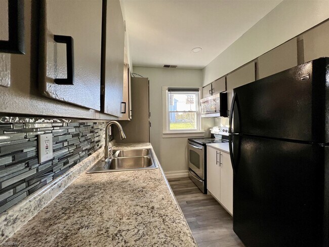 Building Photo - 3 br, 1 bath House - 7111 Rocker Avenue