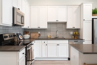 You'll love our thoughtfully designed kitchens with ample cabinetry and counter space. - The Rowan