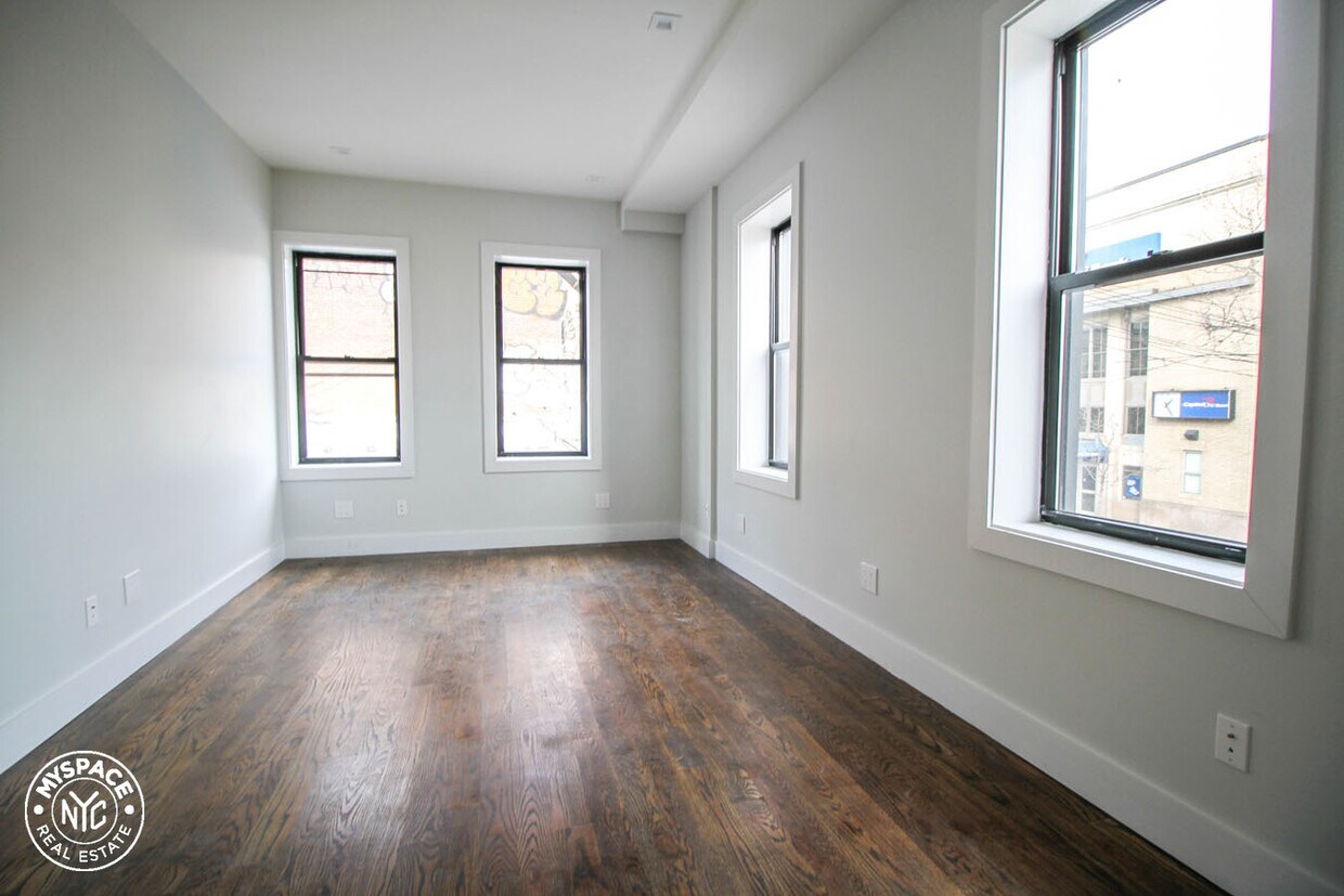 Building Photo - 58-25 Myrtle Ave