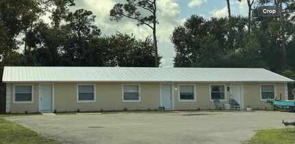 Building Photo - 5108 Sanibel Ave