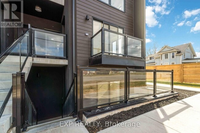 Building Photo - 7277-7277 Wilson Crescent