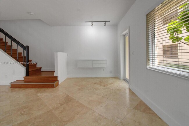 Building Photo - 8954 Collins Ave