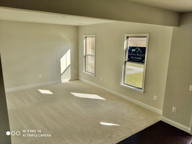 Spacious First-Floor Living Area - 17109 Branched Oak Rd