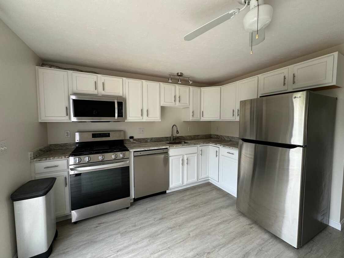 Primary Photo - Updated 2-Bed Townhouse| Lowell, MA| Pet-O...