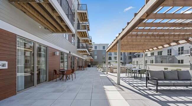 At Modera Newton, select apartment homes feature private balconies and patios. - Modera Newton