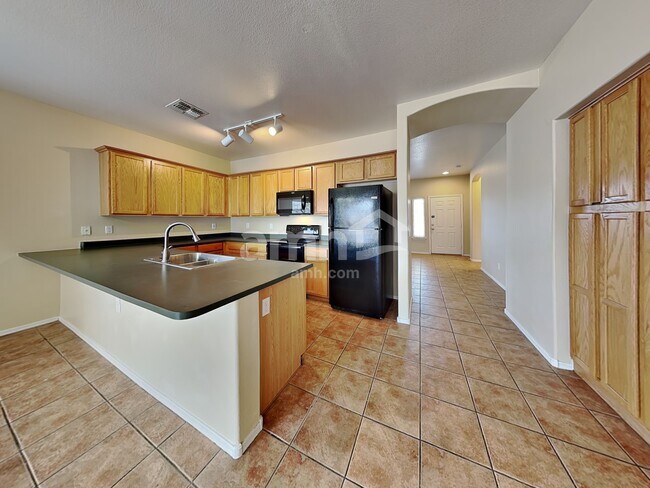 Foto del edificio - 11852 W Cambridge Ave
