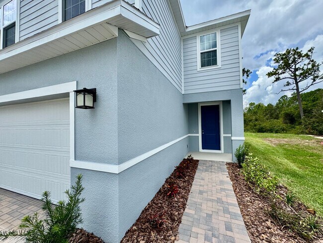 Foto del edificio - Brand-New 4BR Home with Tile Floors & Quar...