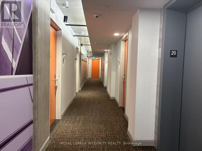 Photo du bâtiment - 105 Champagne Ave S