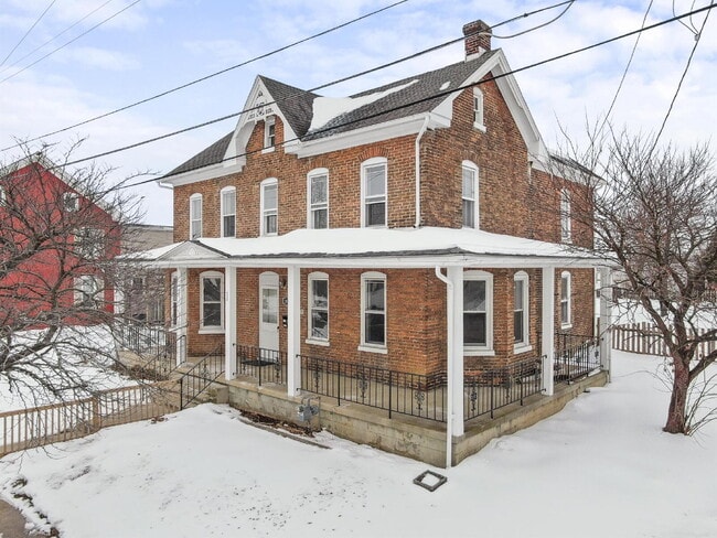 Building Photo - Charming 3-Bedroom Single-Family Home with Wrap-Around Porch & Private Fenced Yard