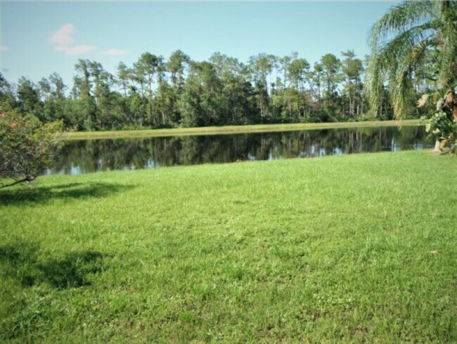 Backyard with Water Front View - 2183 Heathwood Cir