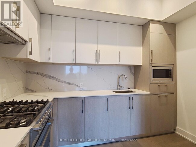 Photo du bâtiment - 8-908 Manor Rd W