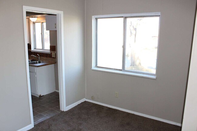 Building Photo - Freshly painted four bedroom ranch.