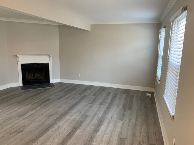 Living room w/wood burning fireplace - 10813 Fallsington Ct
