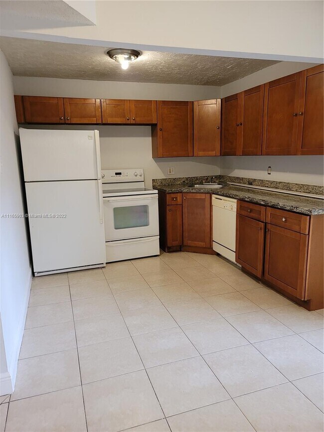 Building Photo - 5970 NW 25th Ct